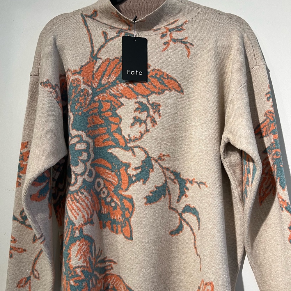 Brand new floral accent sweater.